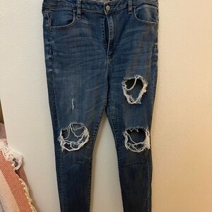 American Eagle OutfittersSuper Stretch Ripped Dark Blue Skinny Jeans